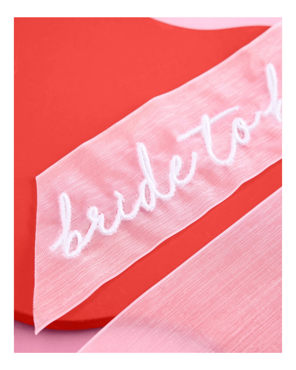 Pink bride to be sash for bridal shower from Parte Haus party supply store in Bethesda MD
