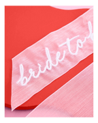 Pink bride to be sash for bridal shower from Parte Haus party supply store in Bethesda MD