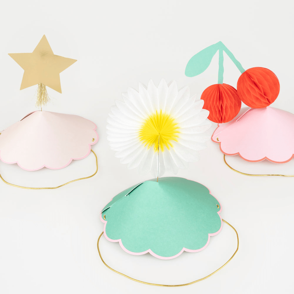Pastel and gold party hats with star daisy and cherry toppers birthday from Parte Haus party supply store in Bethesda MD
