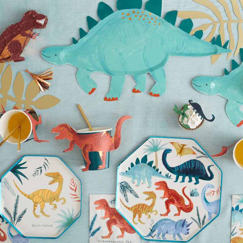 Colorful dinosaur themed plates cups and decorations kids birthday from Parte Haus party supply store in Bethesda MD
