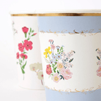 Blue and white floral paper cups with gold trim spring theme from Parte Haus party supply store in Bethesda MD.