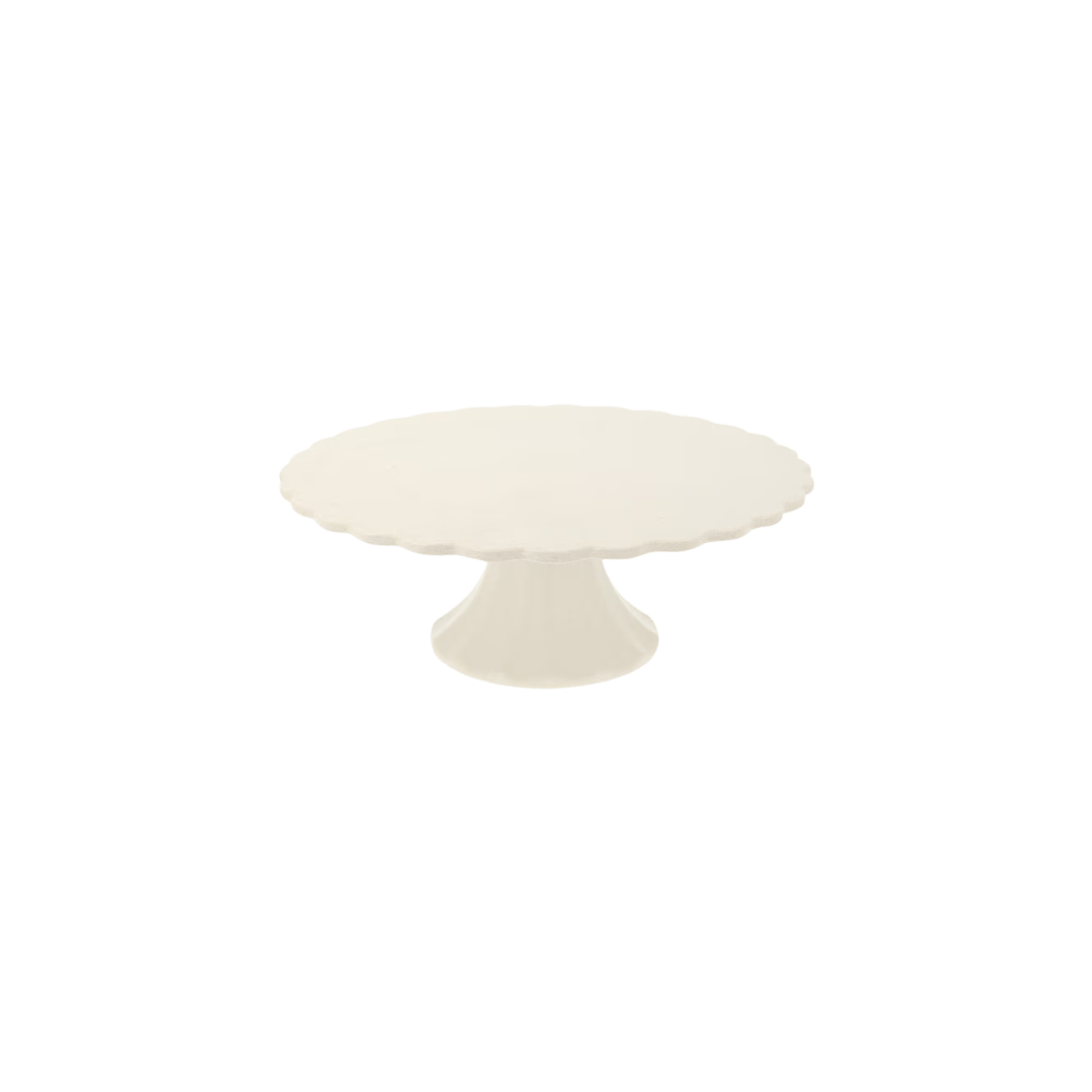 Ivory cake stand with scalloped edge for birthday theme from Parte Haus party supply store in Bethesda MD.