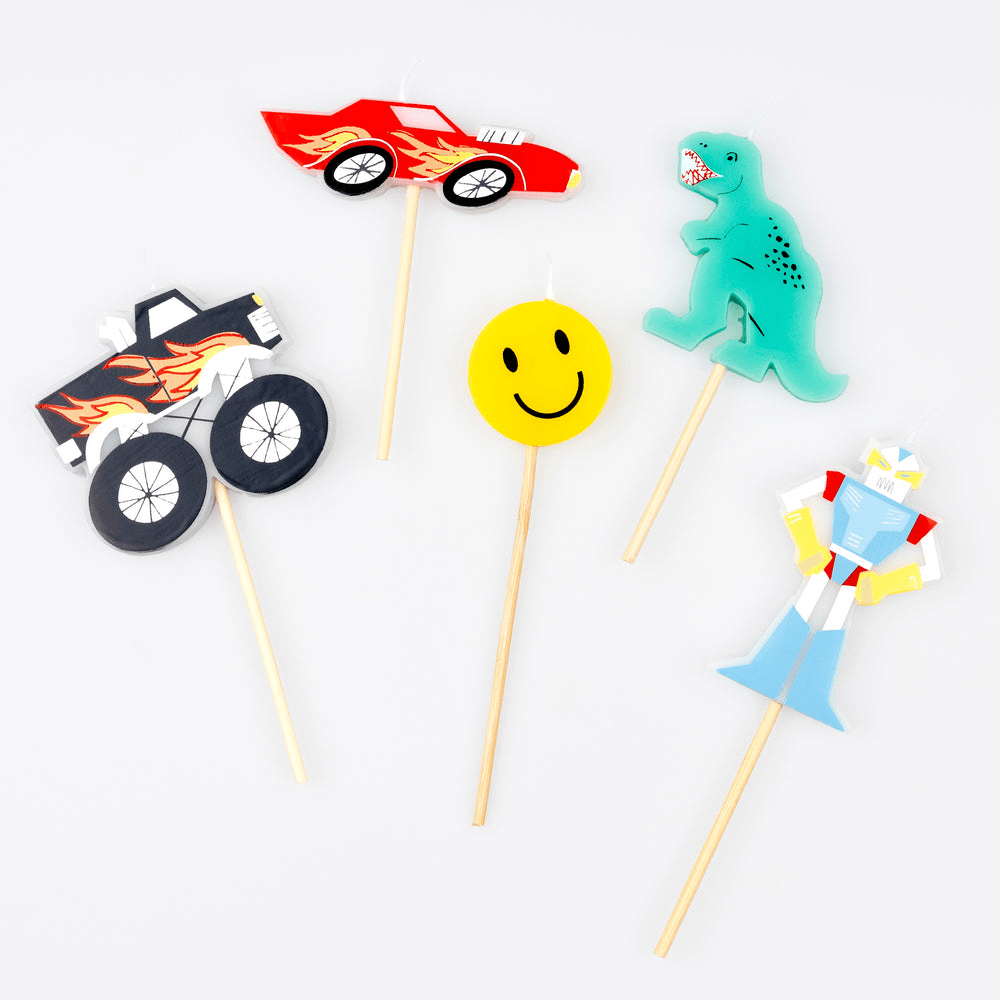 Colorful character candles with car dinosaur smiley and robot theme birthday from Parte Haus party supply store in Bethesda MD