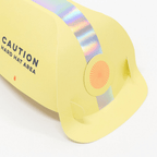 Yellow paper construction hat with holographic stripe birthday theme from Parte Haus party supply store in Bethesda MD.