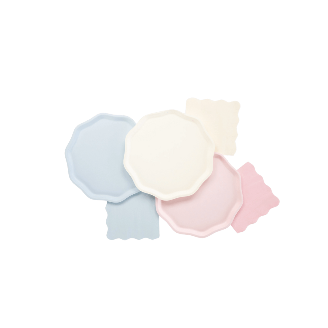 Pastel blue pink cream plates with scalloped edges perfect for birthday theme from Parte Haus party supply store in Bethesda MD.