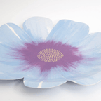 Blue flower shaped plate with purple and gold center for spring from Parte Haus party supply store in Bethesda Maryland