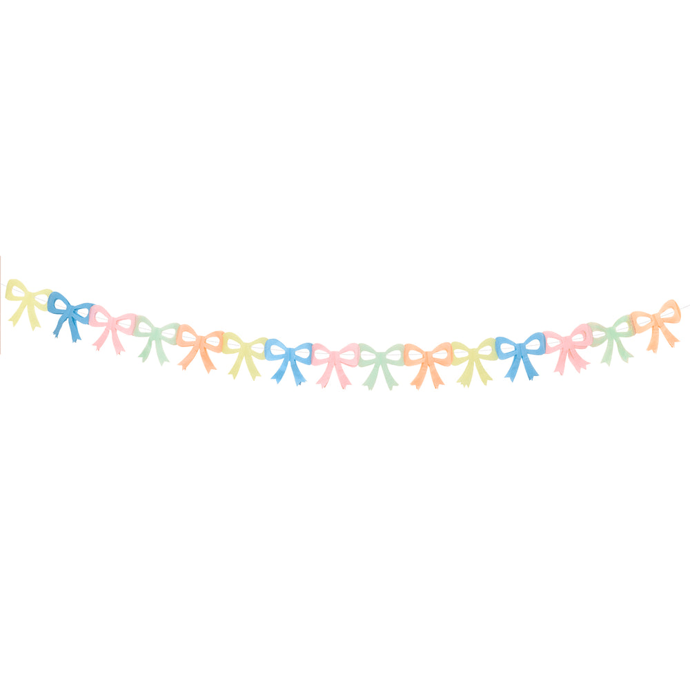 Pastel rainbow bow garland with cute ribbon shapes birthday from Parte Haus party supply store in Bethesda MD.