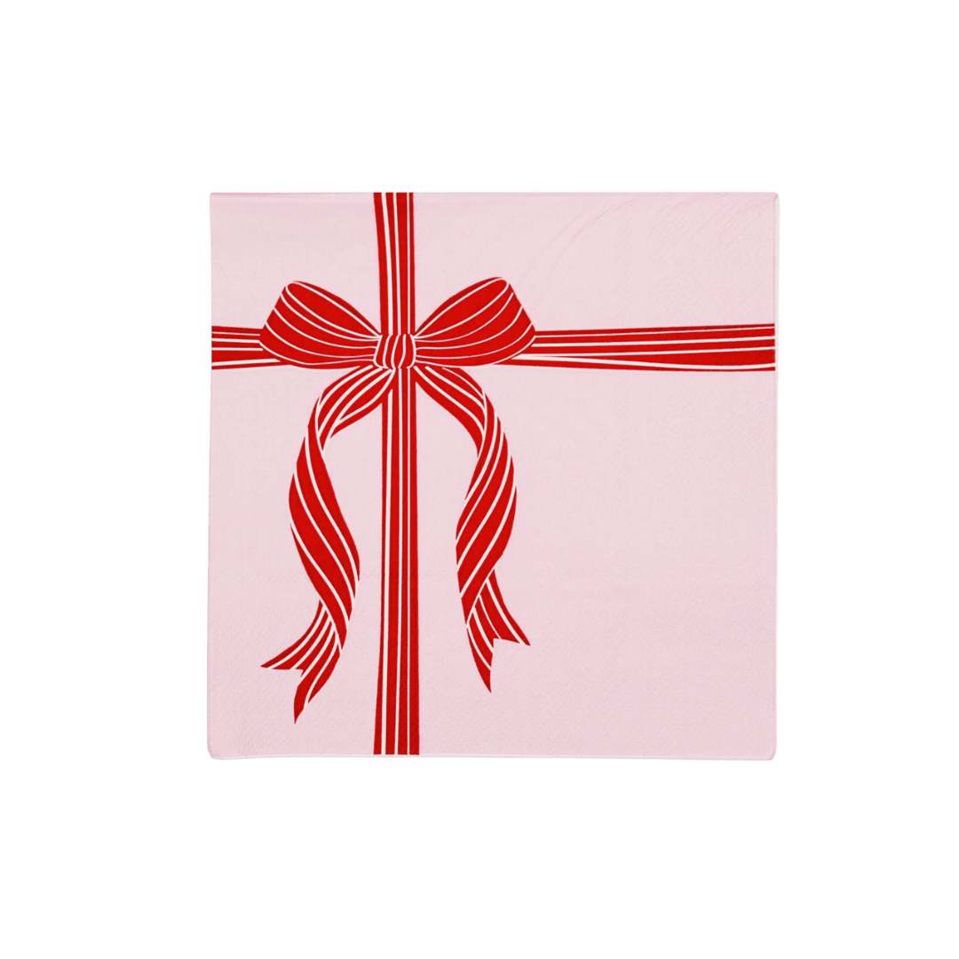 Pink napkin with red ribbon and bow holiday theme from Parte Haus party supply store in Bethesda Maryland