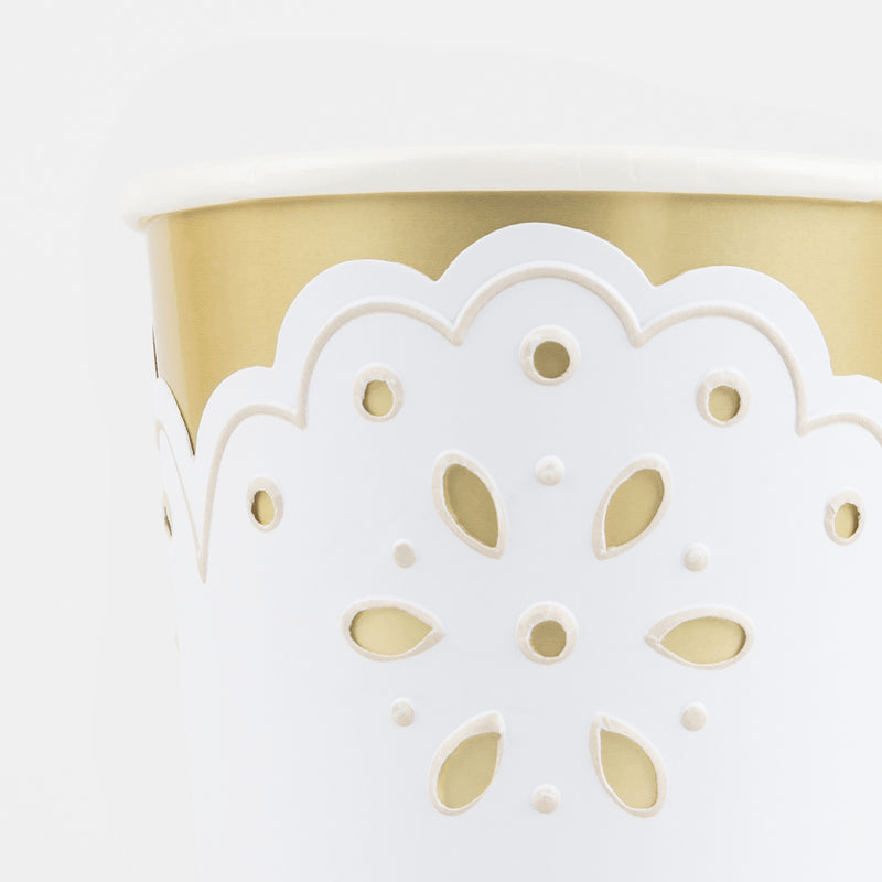 Gold paper cup with scalloped white lace cutout perfect for celebrations from Parte Haus party supply store in Bethesda MD