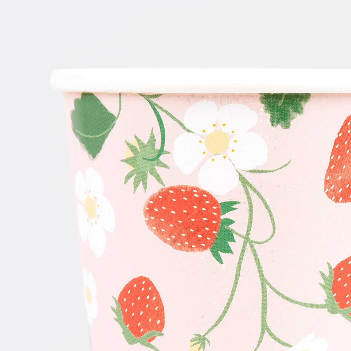 Pink strawberry floral paper cup with white rim spring theme from Parte Haus party supply store in Bethesda Maryland
