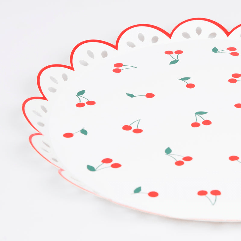 Red and white scalloped edge paper plate with cherry print summer picnic theme from Parte Haus party supply store in Bethesda MD
