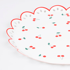 Red and white scalloped edge paper plate with cherry print summer picnic theme from Parte Haus party supply store in Bethesda MD