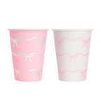 Pink and white paper cups with pastel ribbon bows birthday theme from Parte Haus party supply store in Bethesda MD