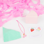 Pink and mint green kids necklace gift set with cherry pendant birthday theme from Parte Haus party supply store in Bethesda Maryland
