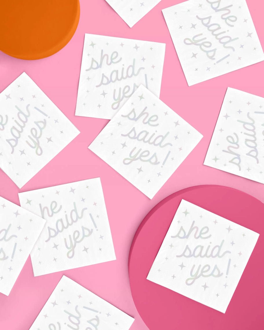 White engagement napkins with she said yes text and stars bridal shower theme from Parte Haus party supply store in Bethesda MD