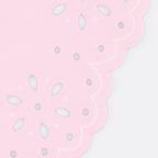 Pink paper doily with scalloped edge and floral cutouts for birthdays from Parte Haus party supply store in Bethesda MD