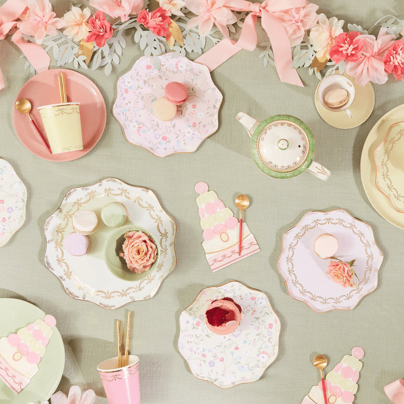 Pastel floral tea party table decor with macarons for birthday from Parte Haus party supply store in Bethesda Maryland