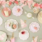 Pastel floral tea party table decor with macarons for birthday from Parte Haus party supply store in Bethesda Maryland