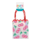 Pink cherry favor bag with red handles for birthday celebration from Parte Haus party supply store in Bethesda Maryland