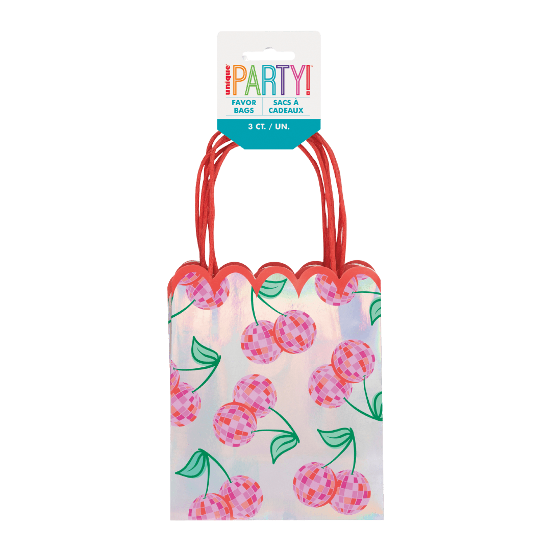 Pink cherry favor bag with red handles for birthday celebration from Parte Haus party supply store in Bethesda Maryland
