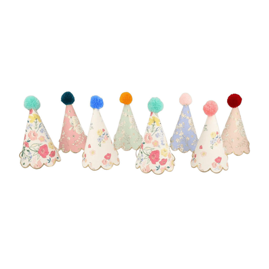 Pastel floral party hats with pom poms birthday celebration theme from Parte Haus party supply store in Bethesda Maryland