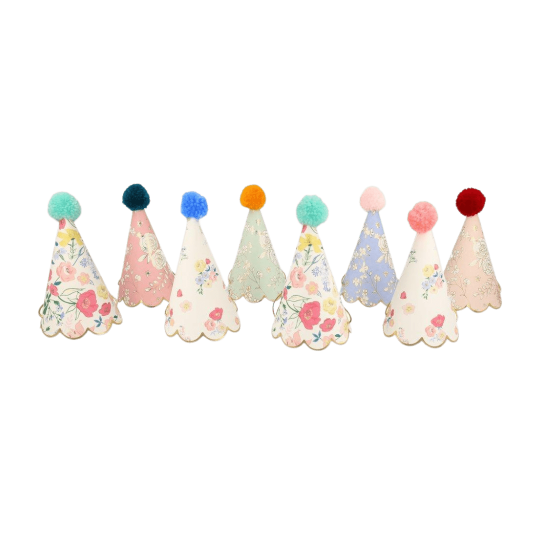 Pastel floral party hats with pom poms birthday celebration theme from Parte Haus party supply store in Bethesda Maryland