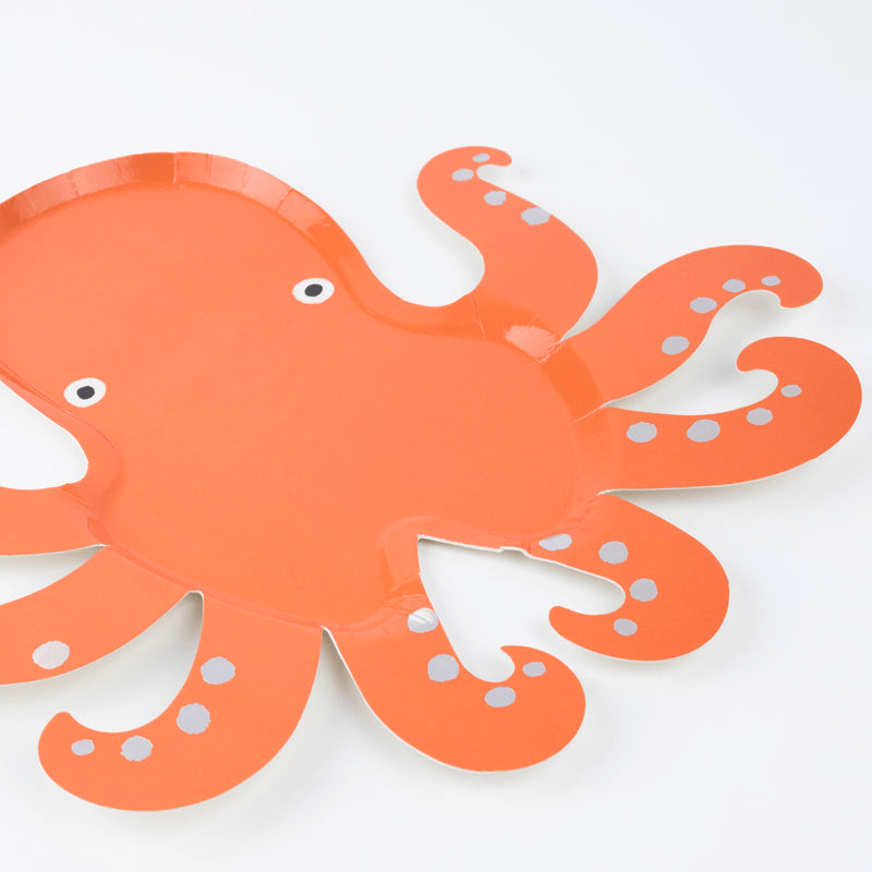 Orange octopus shaped plate with white spots ocean theme from Parte Haus party supply store in Bethesda Maryland