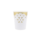 Gold and white cup with floral cutout design for celebration from Parte Haus party supply store in Bethesda MD.