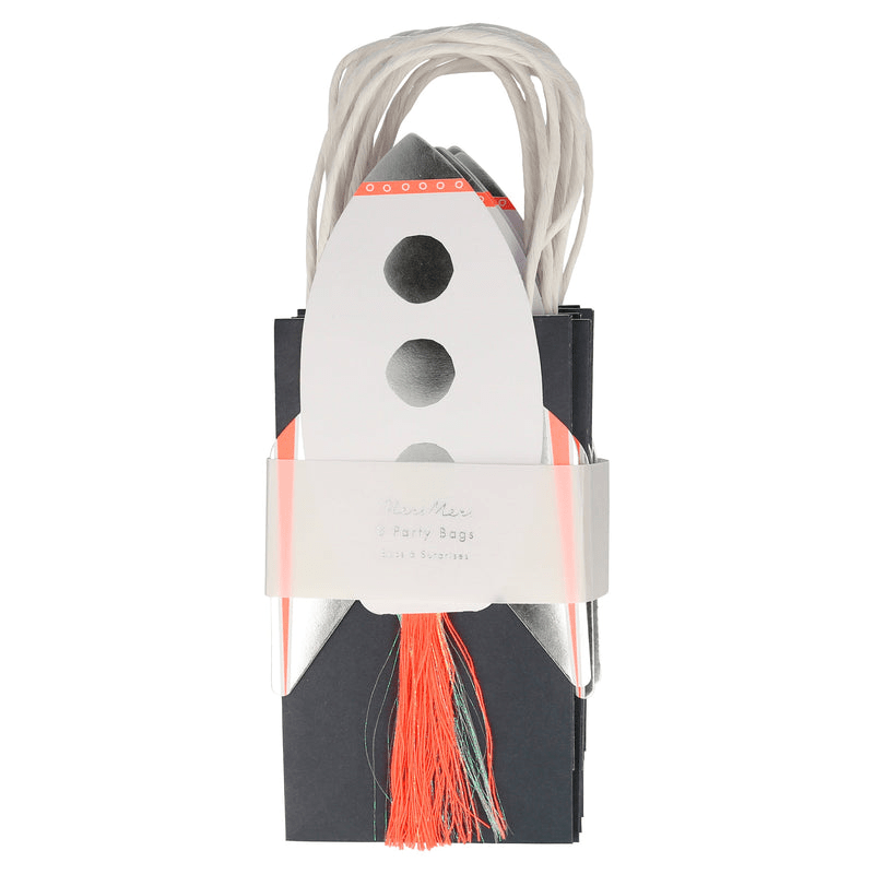 Silver rocket shaped treat bag with red tassel space theme from Parte Haus party supply store in Bethesda Maryland