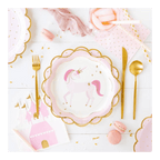 Pink unicorn paper plate with gold edge and castle napkin princess theme from Parte Haus party supply store in Bethesda, Maryland.