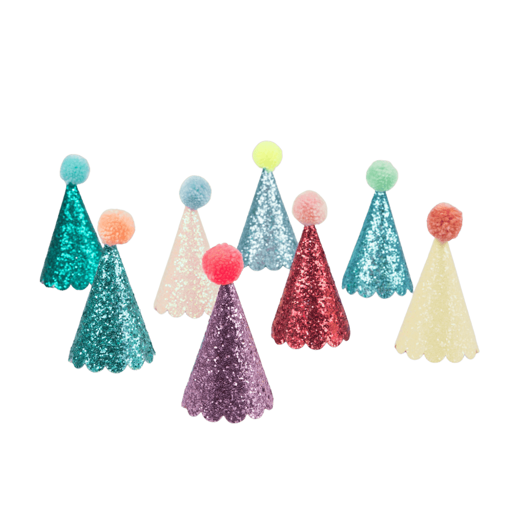 Colorful glitter cone hats with pom poms birthday celebration from Parte Haus party supply store in Bethesda MD.