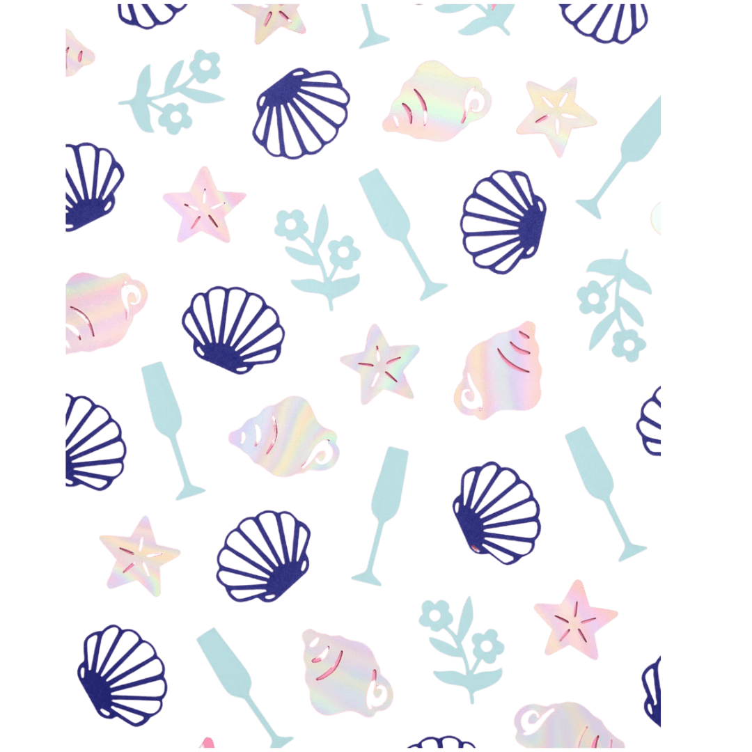 Holographic and pastel confetti with shells and sea stars beach party theme from Parte Haus party supply store in Bethesda Maryland