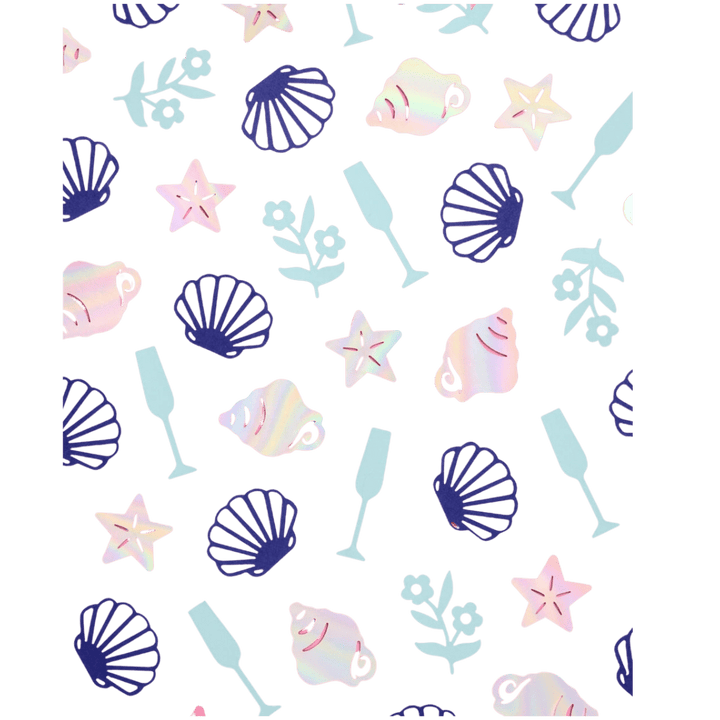 Holographic and pastel confetti with shells and sea stars beach party theme from Parte Haus party supply store in Bethesda Maryland