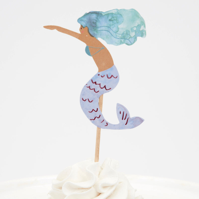 Purple mermaid cake topper with blue hair under the sea theme from Parte Haus party supply store in Bethesda MD.