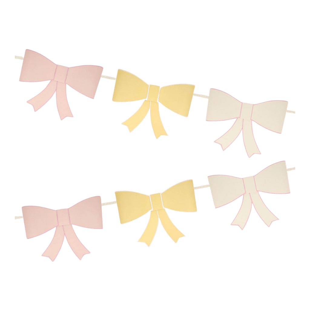 Pastel pink and yellow bow garland decorative banner birthday theme from Parte Haus party supply store in Bethesda MD