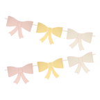 Pastel pink and yellow bow garland decorative banner birthday theme from Parte Haus party supply store in Bethesda MD