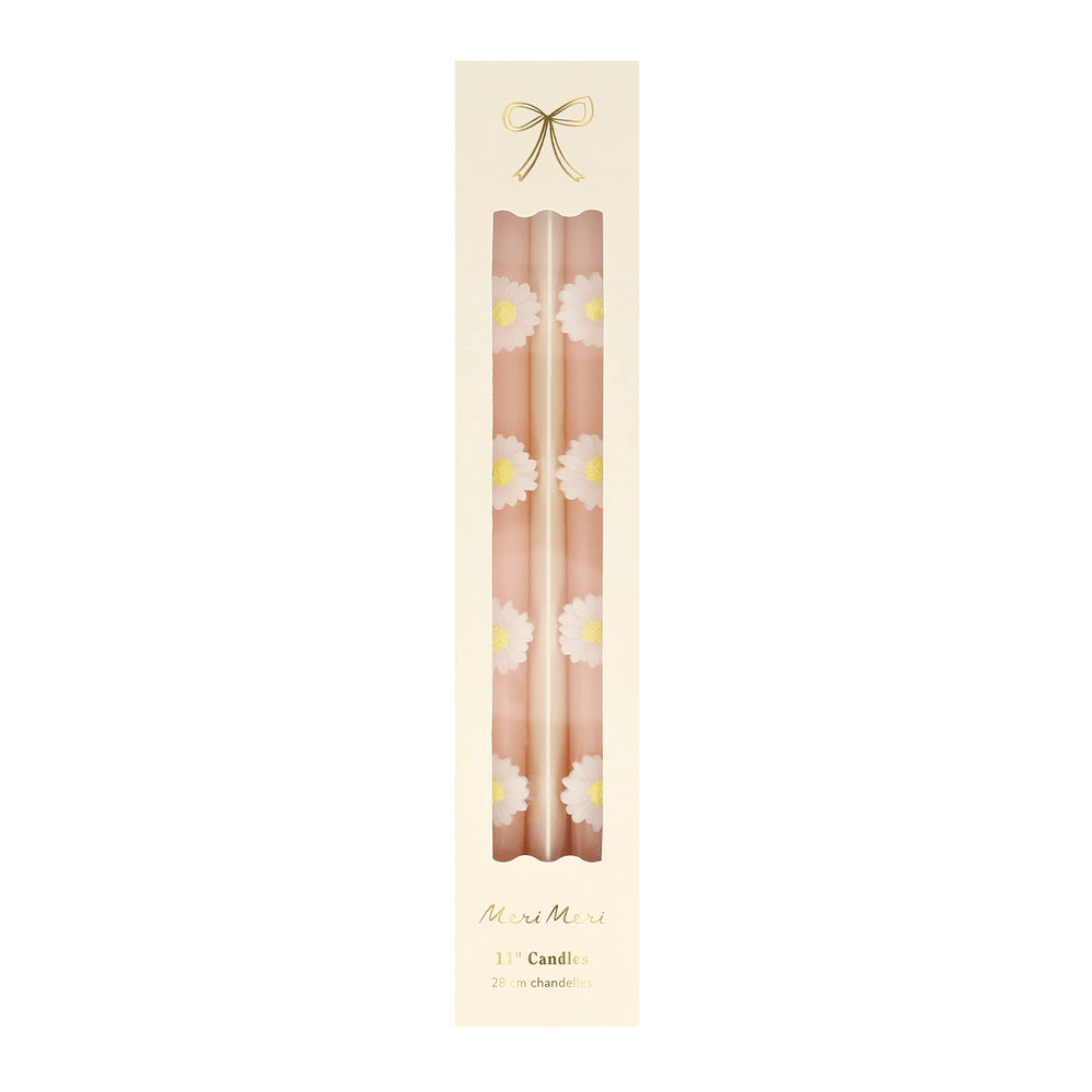 Pink floral taper candles with white daisy design for spring from Parte Haus party supply store in Bethesda Maryland