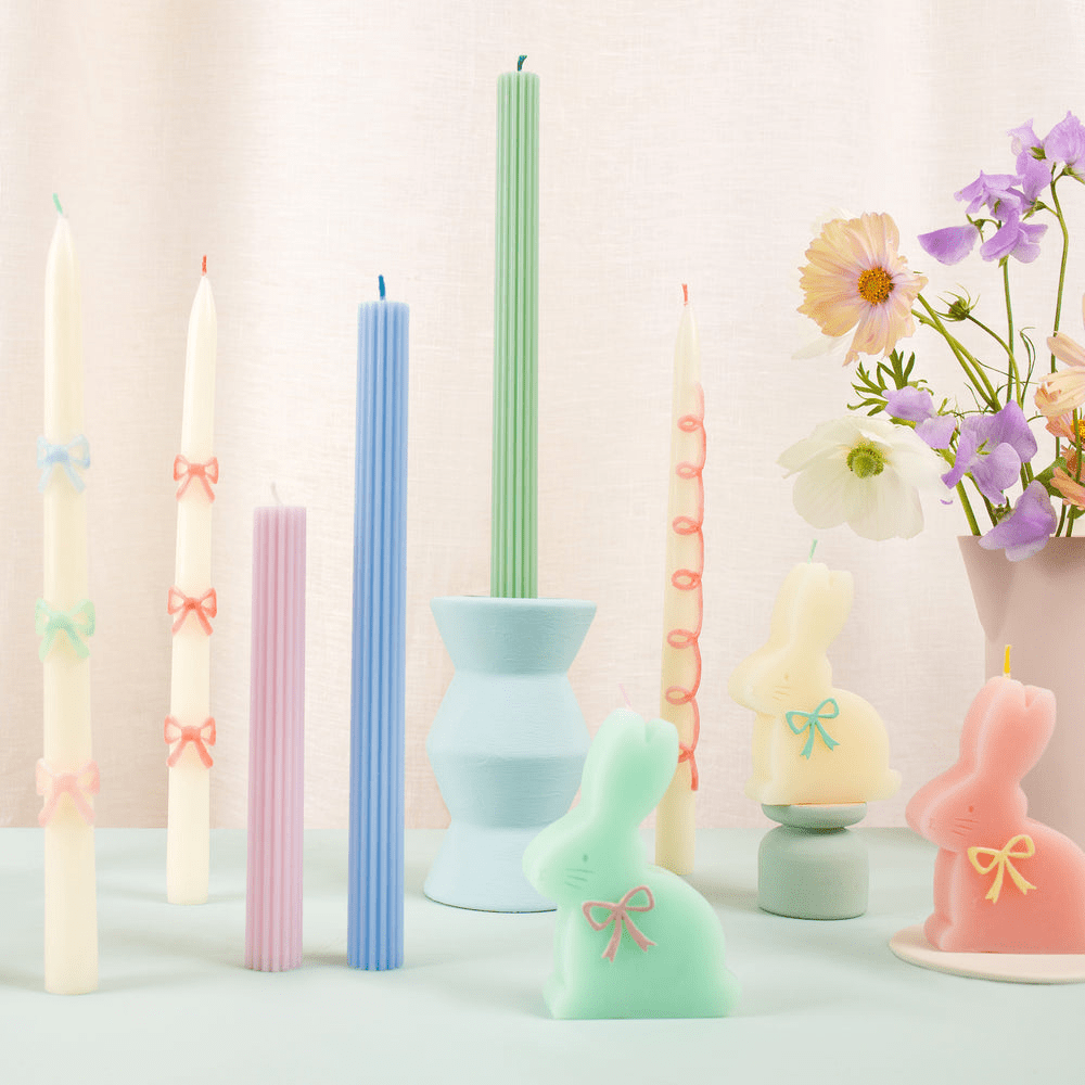 Pastel color candles with bows and bunny shapes for Easter from Parte Haus party supply store in Bethesda Maryland