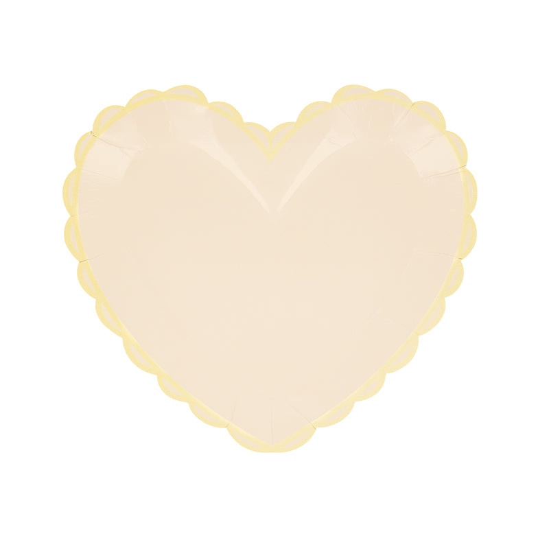 Pale yellow heart shaped plate with scalloped edge for romantic celebrations from Parte Haus party supply store in Bethesda MD
