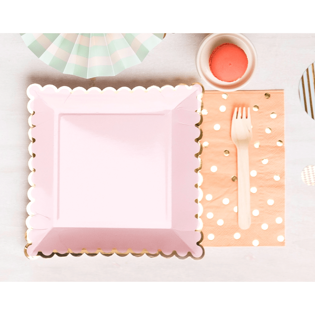 Pink square plate with gold trim pastel table setting for birthday from Parte Haus party supply store in Bethesda MD