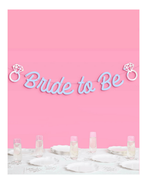 Light blue bride to be banner with diamond rings bridal shower from Parte Haus party supply store in Bethesda Maryland