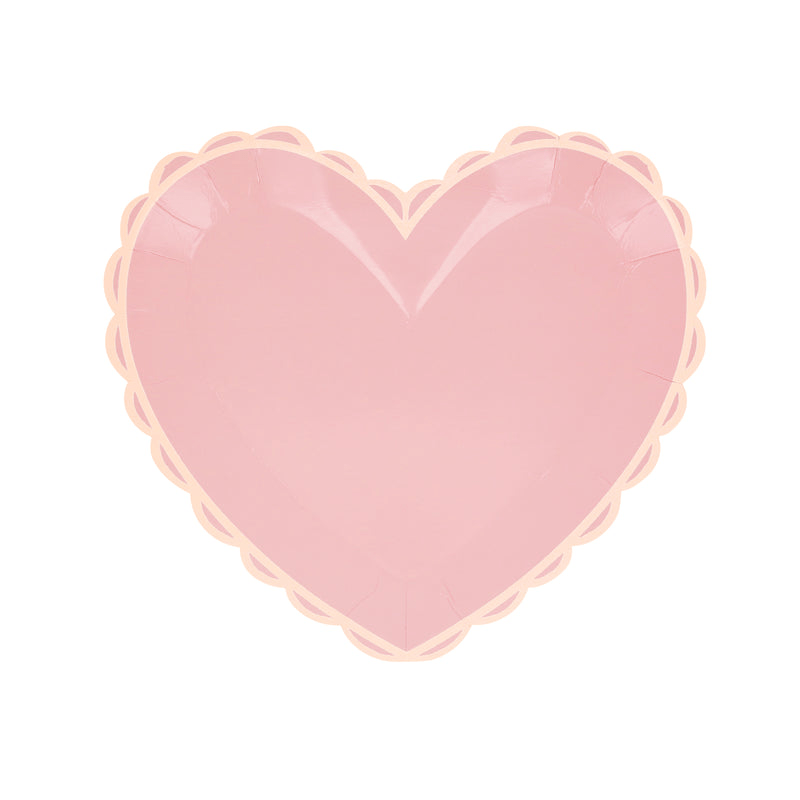 Pink heart shaped plate with scalloped edge for Valentine theme from Parte Haus party supply store in Bethesda Maryland