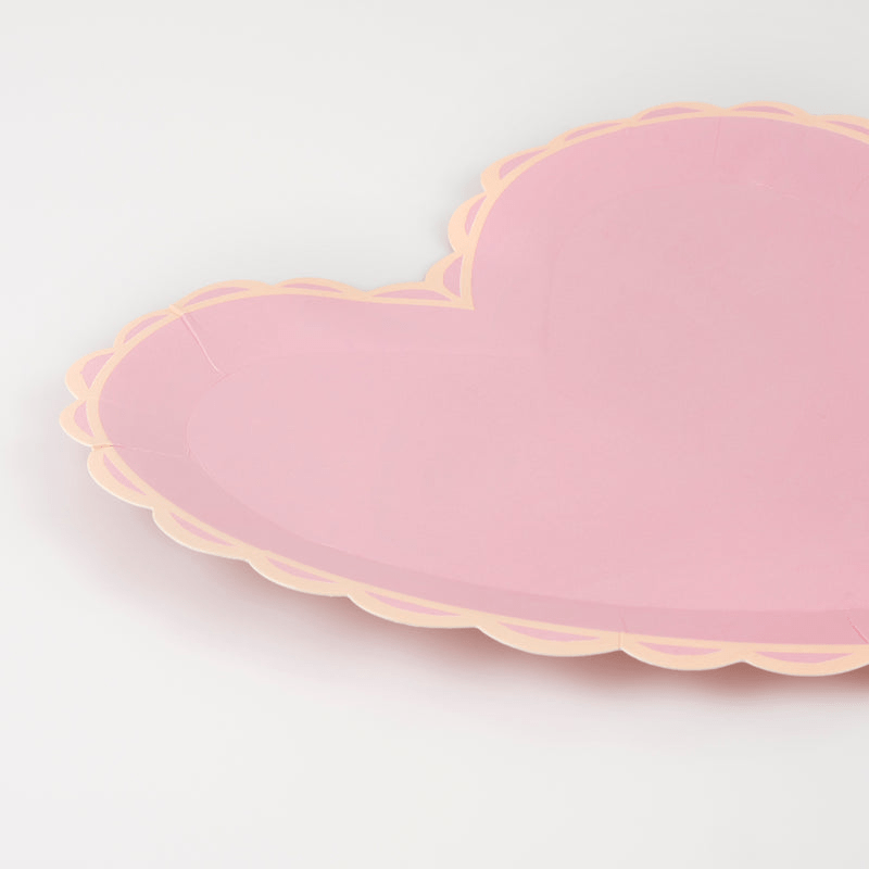 Pink heart plate with scalloped edges for romantic celebration from Parte Haus party supply store in Bethesda Maryland