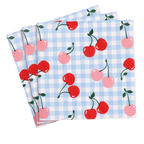 Blue gingham napkin with red and pink cherry print summer picnic theme from Parte Haus party supply store in Bethesda Maryland