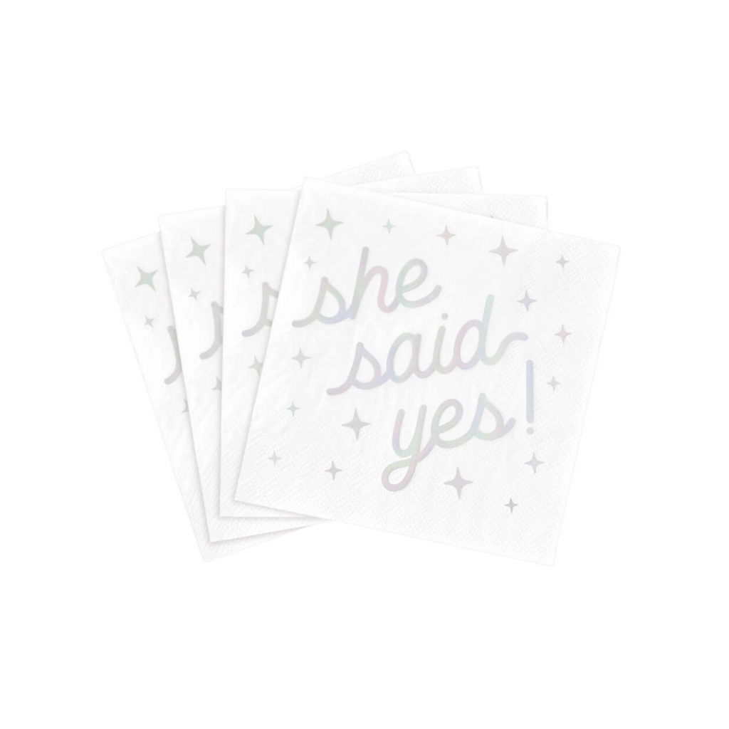 White engagement napkins with she said yes and pastel stars from Parte Haus party supply store in Bethesda Maryland