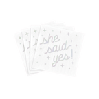 White engagement napkins with she said yes and pastel stars from Parte Haus party supply store in Bethesda Maryland