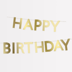 Gold birthday banner with scalloped edges for birthday event from Parte Haus party supply store in Bethesda MD.