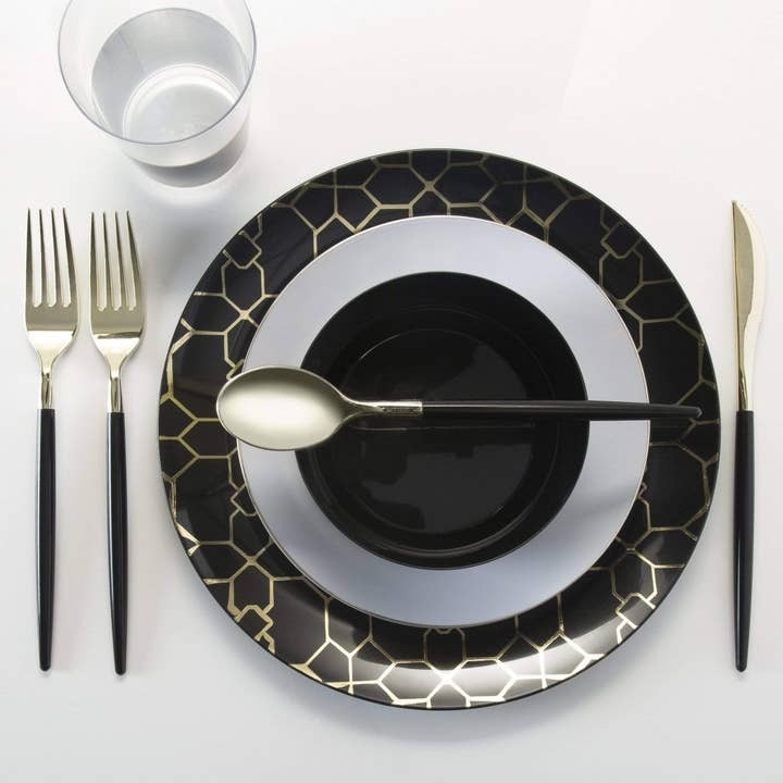 Black and gold plate set with utensils for elegant dinner from Parte Haus party supply store in Bethesda Maryland