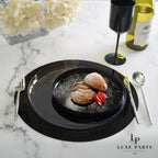 Black plastic plate serving croissants with strawberries brunch tableware from Parte Haus party supply store in Bethesda MD