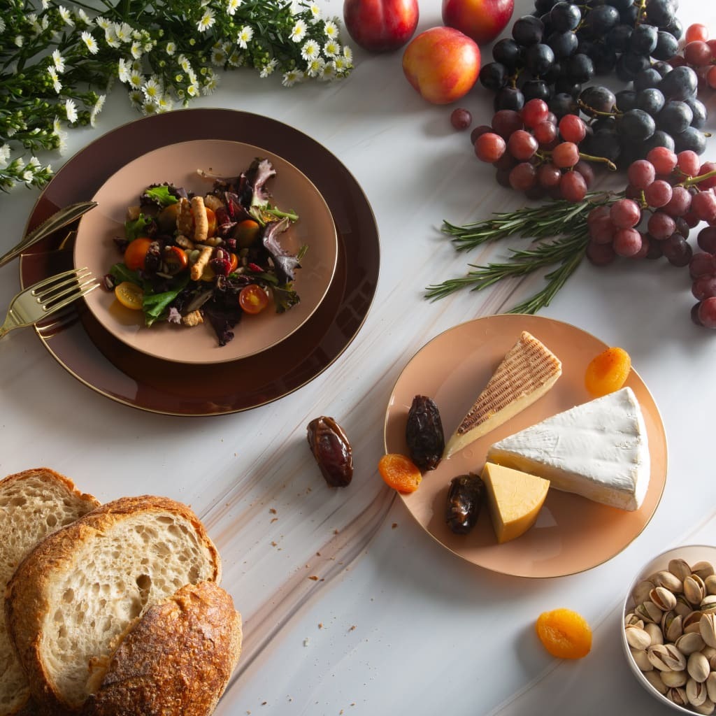 Brown and blush salad and cheese plate set with fruit and bread for elegant gathering from Parte Haus party supply store in Bethesda MD